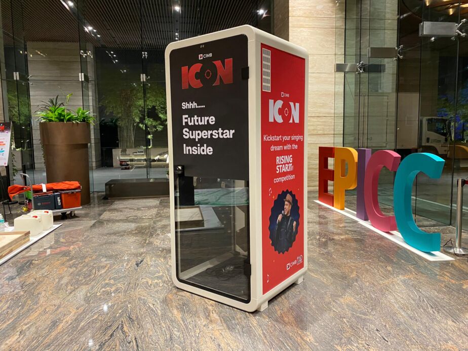 CIMB-branded acoustic booth activation at a corporate lobby event