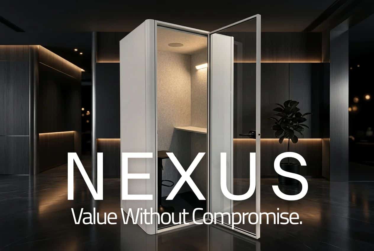 8OOTH Nexus acoustic booth with door open, showing padded interior with desk, seat and lighting, in a modern dark-toned office
